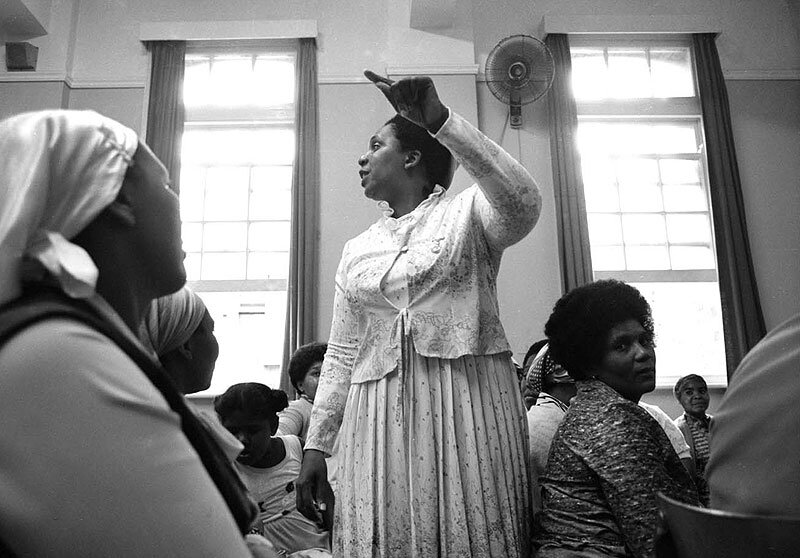 Shop workers discuss strike action at Parish Centre. Durban. 1984