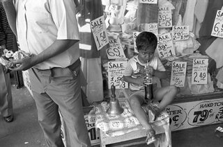 Shopkeeper's son. Grey street. 1979