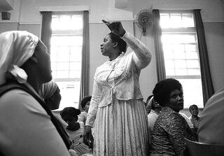 Shop workers discuss strike action at Parish Centre. Durban. 1984